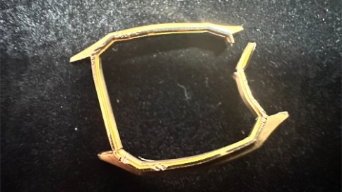 不明金